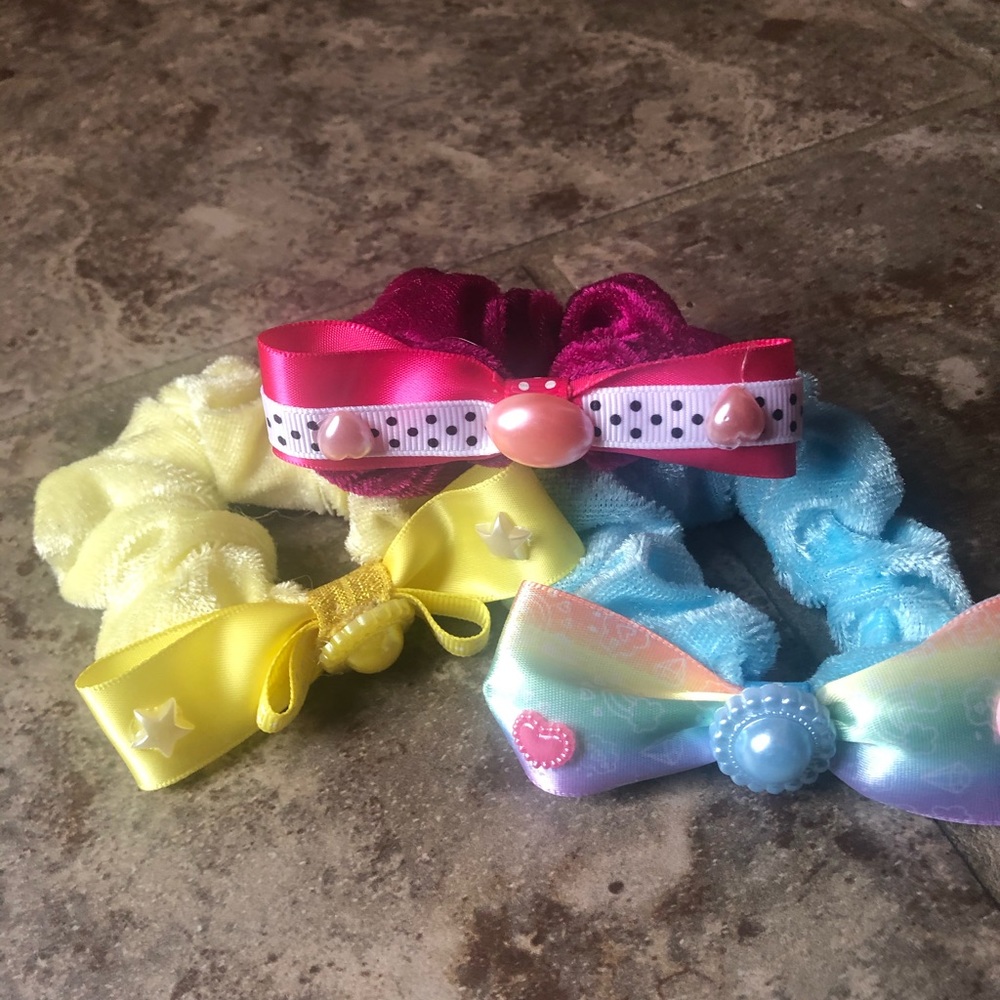 3 pink , yellow and blue scrunchies with ribbon